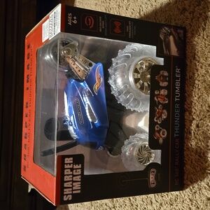NEVER OPENED! Sharper image RC 360 Rally Car Thunder Tumbler.